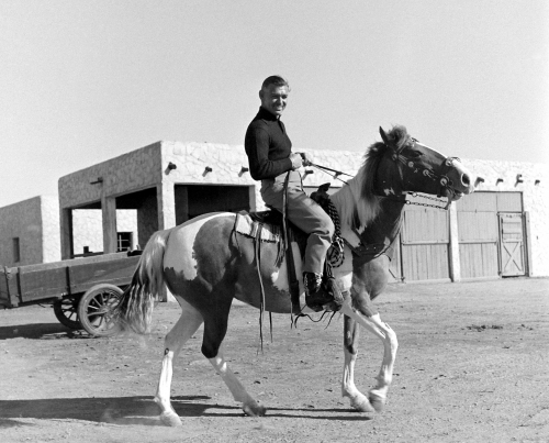 Clark Gable on a horse